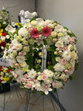 A Circle of Peaceful Remembrance | White, Green & Blush Funeral Wreath